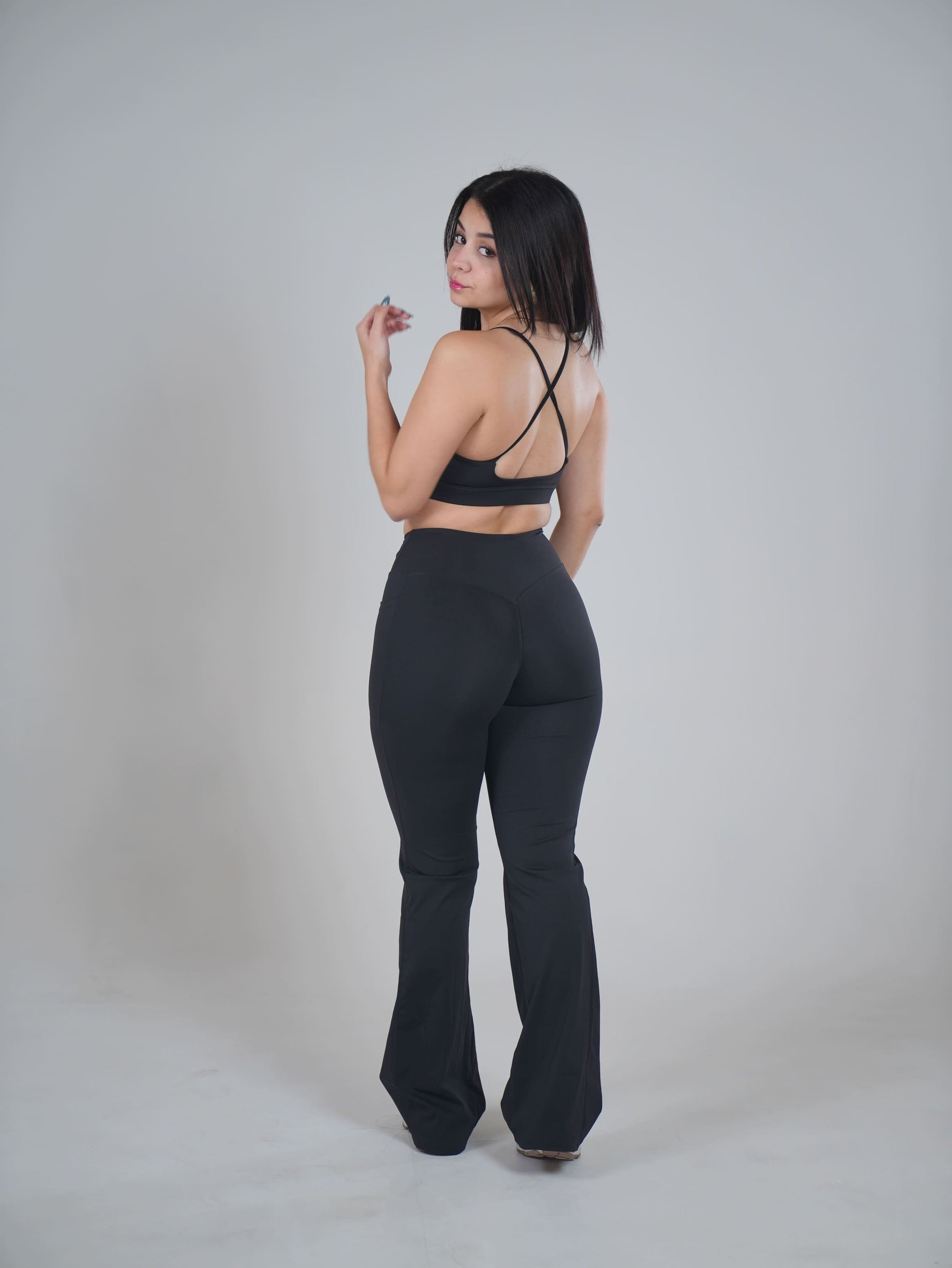 Sport bra y flared leggings.